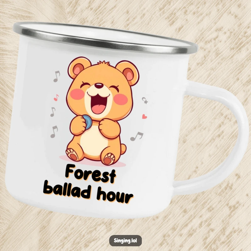 Funny enamel camping mug with a delighted bear cub character belting out a ballad, perfect for outdoor music lovers.