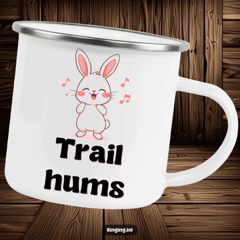 Funny rabbit camping mug with a cute character humming a cheerful song, ready for outdoor adventures and warm beverages.