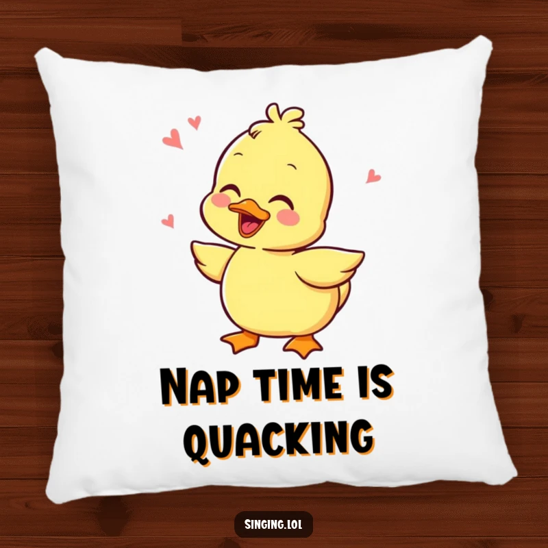 Funny decorative pillow with a plush, giggling duckling character quacking merrily, offering comfort and a dose of humor.