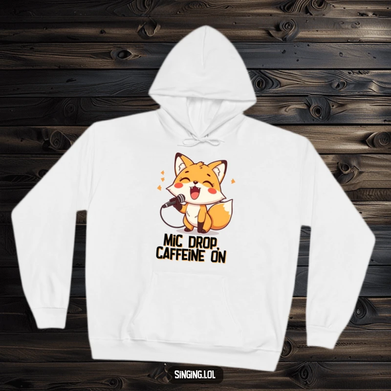 Funny Hoodie depicting a cheerful fox character belting out a tune into a microphone, perfect for music lovers and performers.