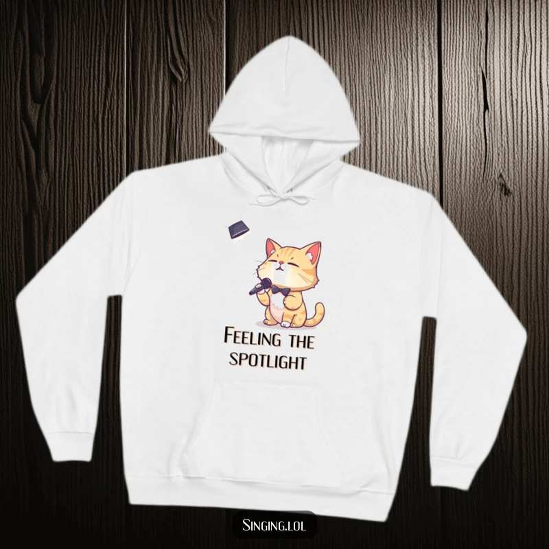 Funny hoodie displaying a debonair cat character passionately crooning into a spotlight, perfect for cozy musical moments.
