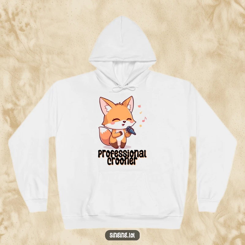 Funny hoodie featuring a content fox with closed eyes, embracing a tiny microphone while singing joyfully.