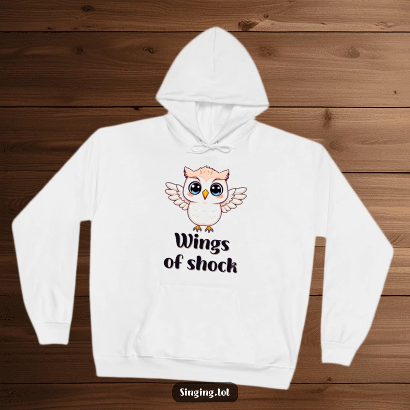 Funny hoodie featuring a surprised owl character with its wings outstretched, embodying a comical expression of shock.