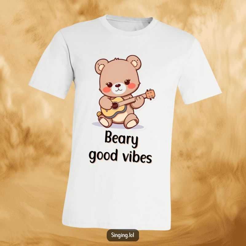 Funny t-shirt showcasing a playful bear cub character strumming a miniature guitar with enthusiasm, a charming rockstar in the making.