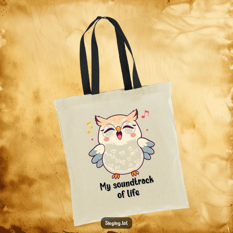 Funny triumphant owl character hooting a cheerful melody, printed on a durable tote bag, ideal for daily use.
